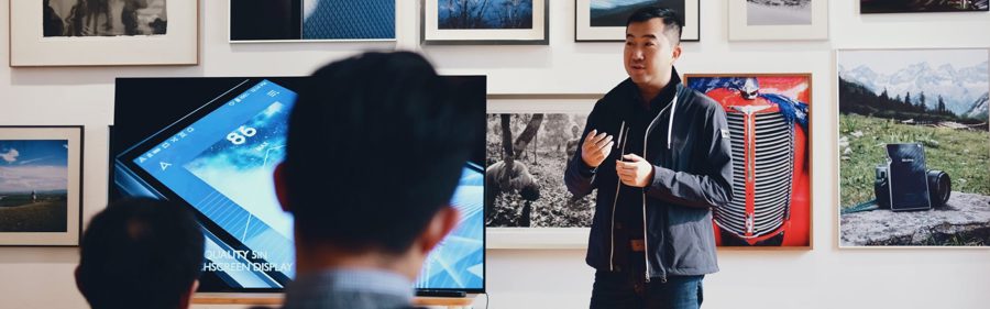 Man presenting a product concept to a small audience