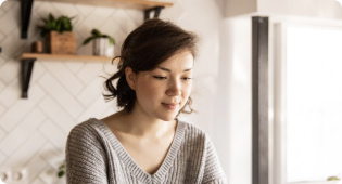 Woman working comfortably from her kitchen table